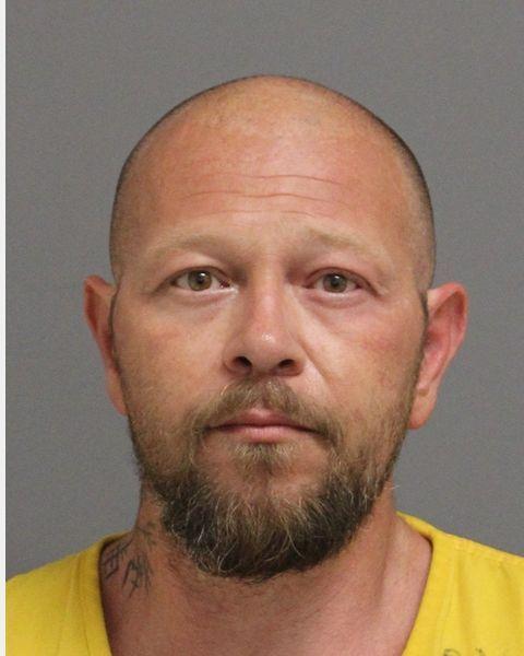 Adult male booking photo of Braxton Keller.