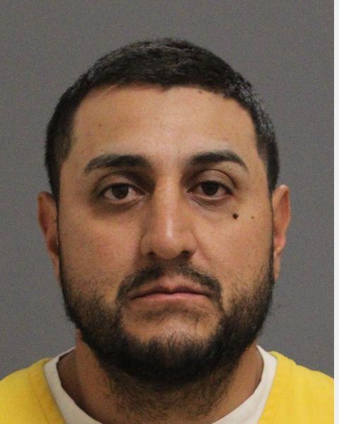 Adult male booking photo of Reymundo Ruiz.