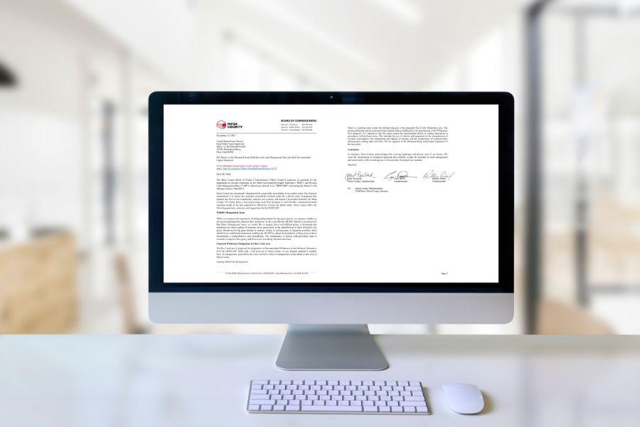 A letter is displayed on a computer screen.