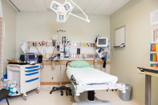 hospital room including bed and various equipment