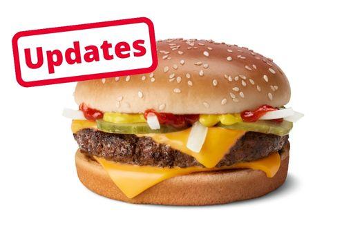 Image of quarter pounder cheeseburger with cheese, pickles, onions, and ketchup on a sesame bun. There is a text overlay on the image that says updates.
