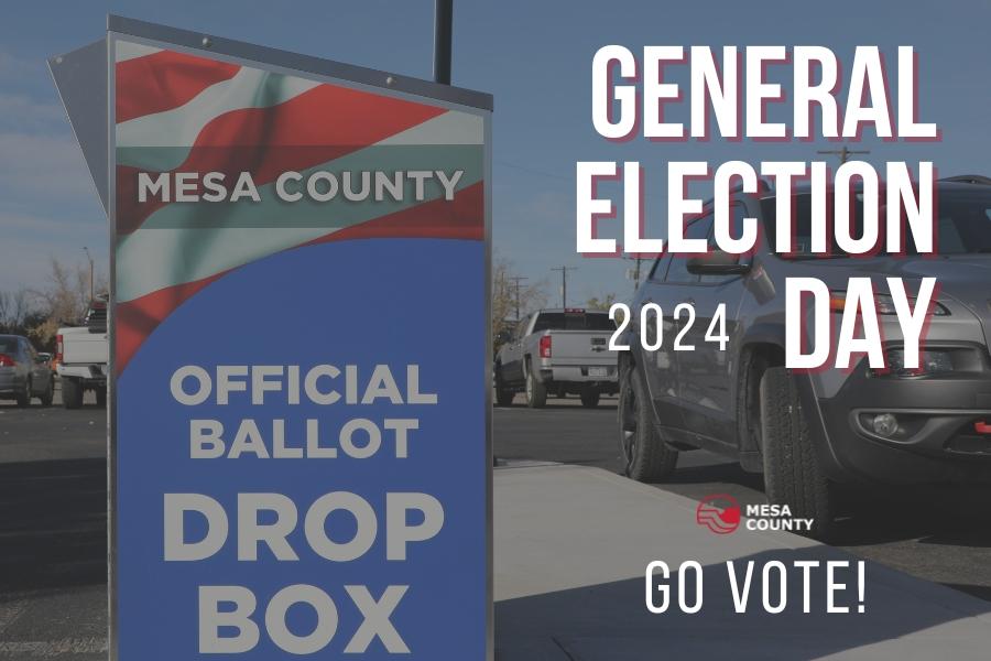 Blue and red Mesa County ballot drop box with white text reading, "General Election Day 2024 Go Vote," and the red and white Mesa County logo.