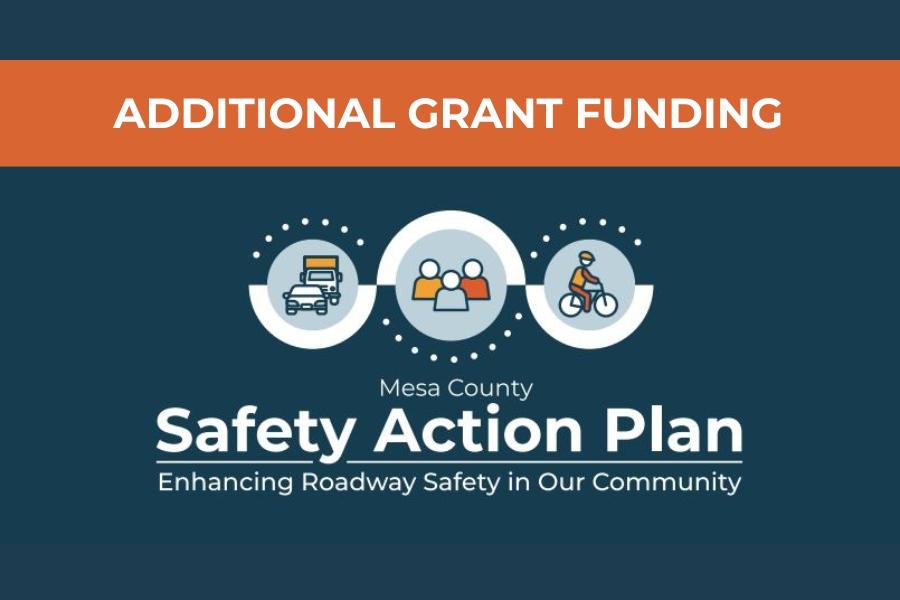 Dark blue background with three elements of people, bikes, and cars with white text reading, "ADDITIONAL GRANT FUNDING Mesa County Safety Action Plan Enhancing Roadway Safety in Our Community."