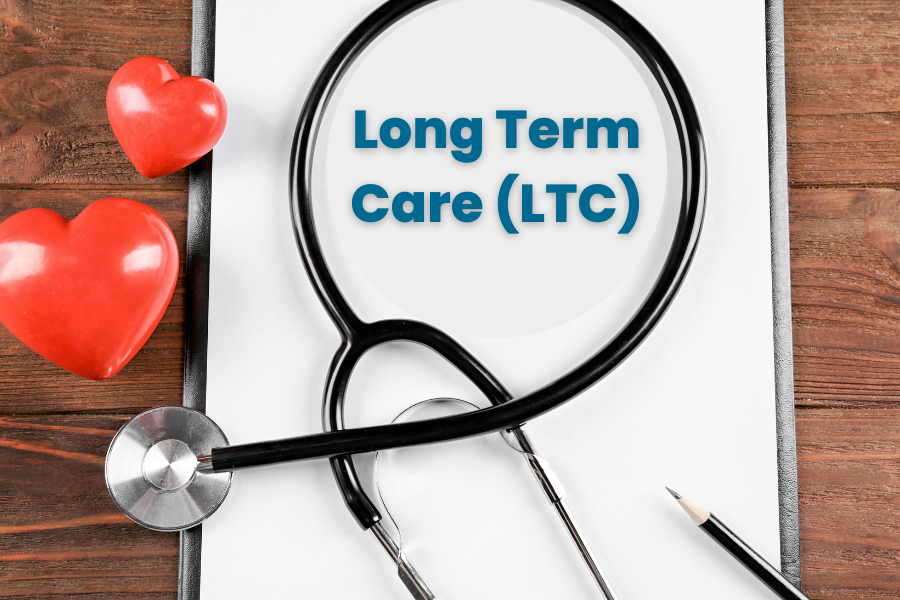 Long term care on a medical notepad with equipment and hearts.