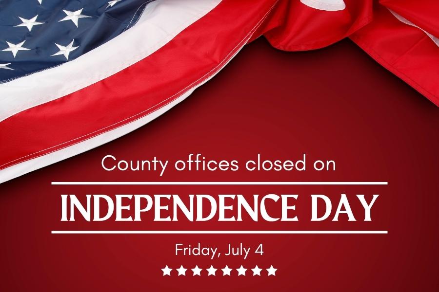 Red background and American flag on the top with white text reading, County offices closed on Independence Day, Friday, July 4.
