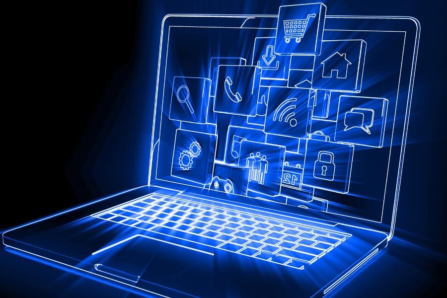 A glowing outline of a laptop with several technology related emblems. 