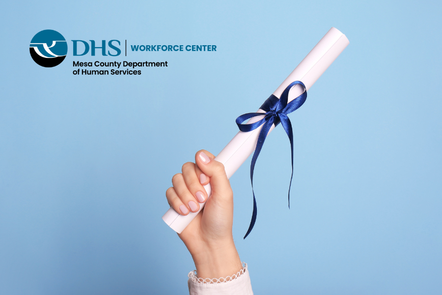 Diploma held in the air with blue background and WFC logo